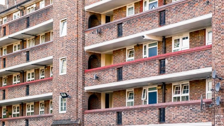 Red brick housing block with balcony's